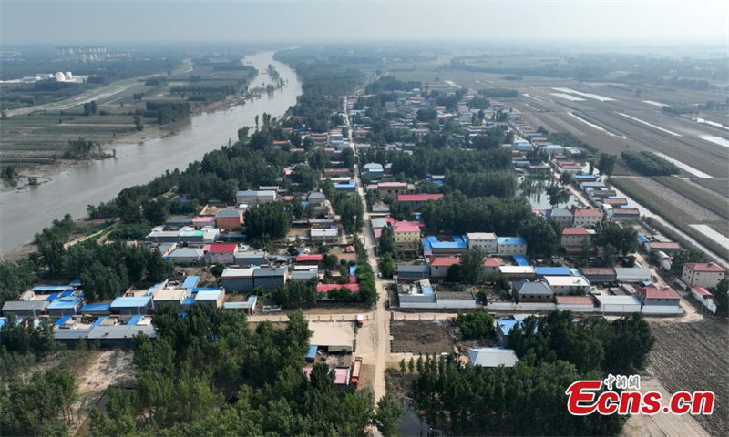 Muonekano kutoka angani wa Mji Mdogo wa Diaowo uliokumbwa na mafuriko huko Zhuozhou, Mkoa wa Hebei, kaskazini mwa China, Agosti 9, 2023.(Picha na: China News Service/Han Bing)