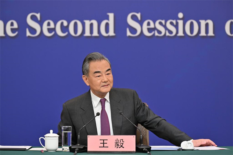Chinese Foreign Minister Wang Yi, also a member of the Political Bureau of the Communist Party of China Central Committee, attends a press conference on China's foreign policy and foreign relations on the sidelines of the second session of the 14th National People's Congress (NPC) in Beijing, capital of China, March 7, 2024. (Xinhua/Cai Yang)