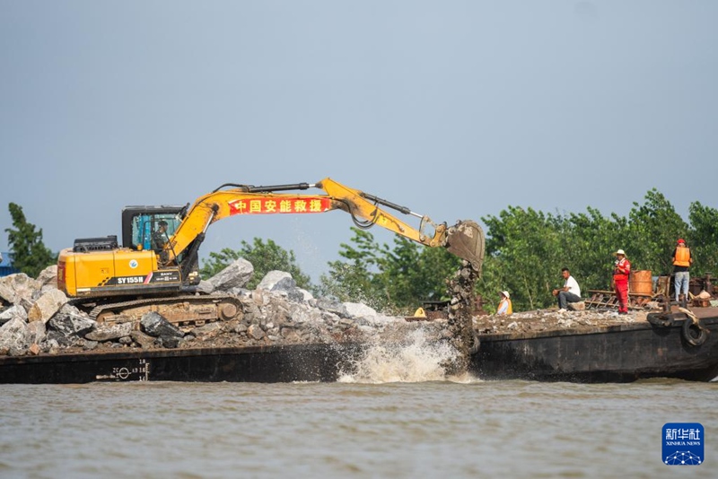 Lambo la Ziwa Doting la China lililobomoka kutokana na mafuriko ya mvua kubwa lazibwa