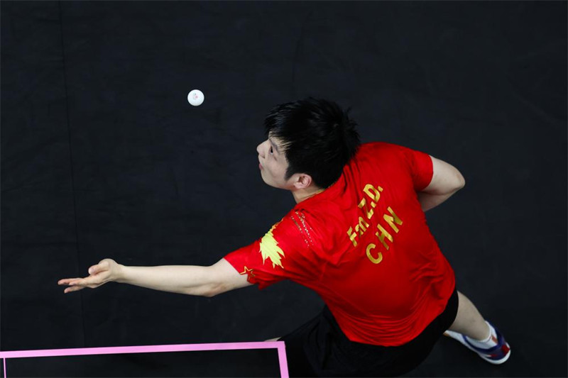 Fan Zhendong akiwa kwenye mashindano, Agosti 4. (Xinhua/ Chen Yichen) 