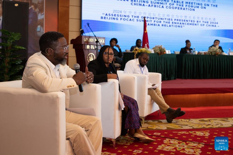 Wageni wakihudhuria mkutano wa majadiliano ya wazi uliolenga kutathmini fursa zilitolewa na Mkutano wa Kilele wa 2024 wa Baraza la Ushirikiano kati ya China na Afrika (FOCAC) kwa ajili ya kuimarisha uhusiano kati ya China na Zambia uliofanyika mjini Lusaka, Zambia, Oktoba 18, 2024. (Xinhua/Peng Lijun)