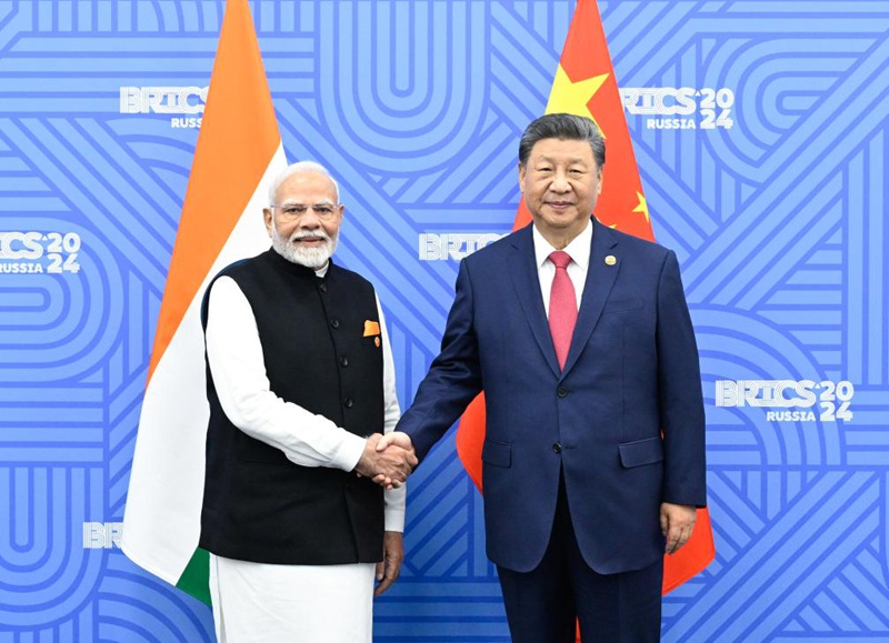 Rais Xi Jinping wa China akikutana na Waziri Mkuu wa India Narendra Modi  katika wakati wa Mkutano wa 16 wa Viongozi wa BRICS  huko Kazan, Russia, Oktoba 23, 2024. (Xinhua/Shen Hong)