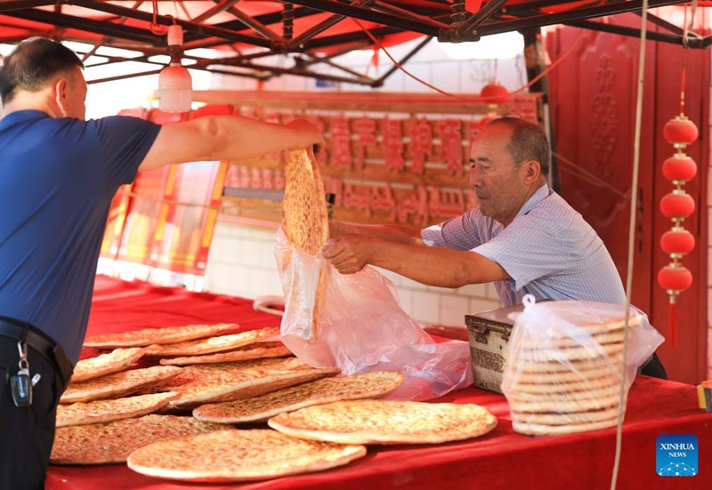 Mbinu za kijadi za kutengeneza mkate wa naan zarithiwa na kuendelezwa Xinjiang, China